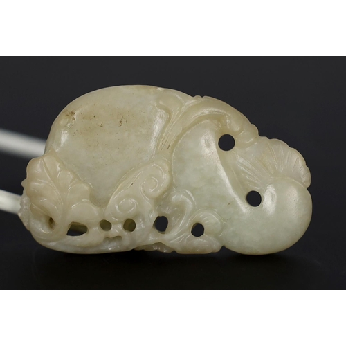 218 - * * A Chinese pale celadon jade carving of a stylised catfish, probably 17th century, the reverse ca... 