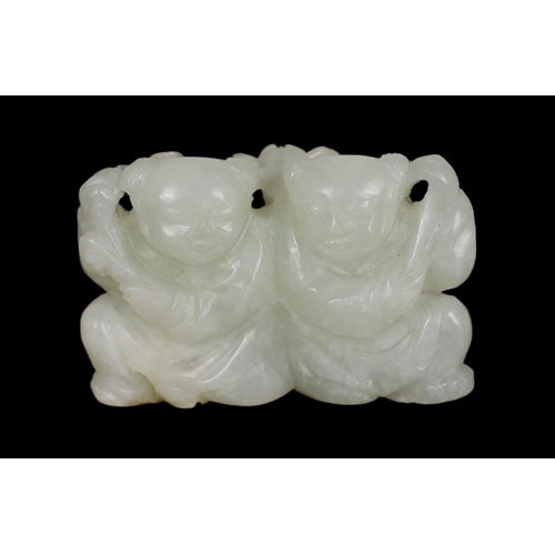 219 - * * A Chinese pale celadon jade carving of the He He Erxian twins, 18th/19th century, one boy holdin... 