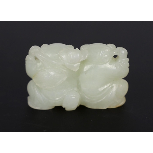 219 - * * A Chinese pale celadon jade carving of the He He Erxian twins, 18th/19th century, one boy holdin... 