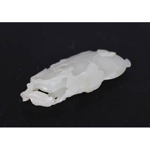 221 - * * A Chinese white jade pendant, carved as a gourd, Qianlong period, with overlapping leaves and te... 