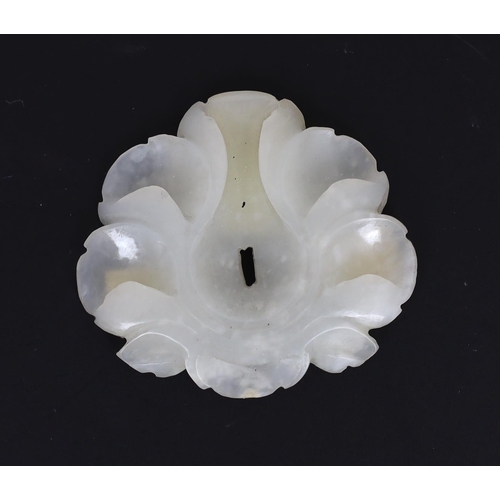 223 - * * A Chinese small white jade flower head, Song/Yuan dynasty, 12th/13th century, in the form of a h... 