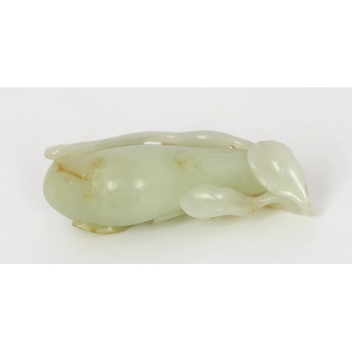 225 - * * A Chinese pale celadon jade carving of a fruit, 18th century, with stalks and leaves, a flower t... 