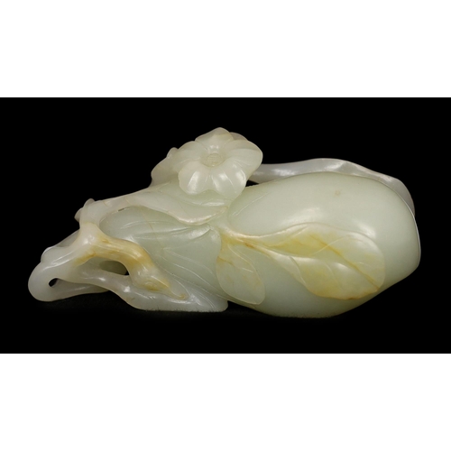 225 - * * A Chinese pale celadon jade carving of a fruit, 18th century, with stalks and leaves, a flower t... 