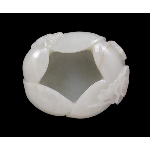 228 - * * A Chinese pale celadon jade waterpot, 17th/18th century, formed as overlapping petals and worked... 