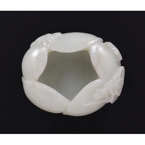 228 - * * A Chinese pale celadon jade waterpot, 17th/18th century, formed as overlapping petals and worked... 