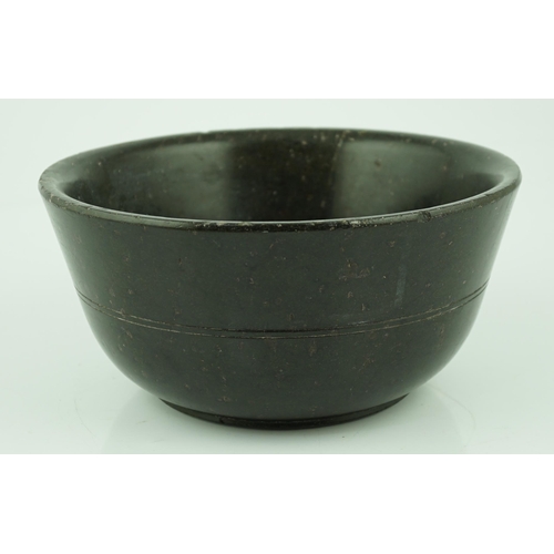 237 - A Chinese snakeskin soapstone bowl, Tang dynasty or later, of plain form with ring turning to the mi... 