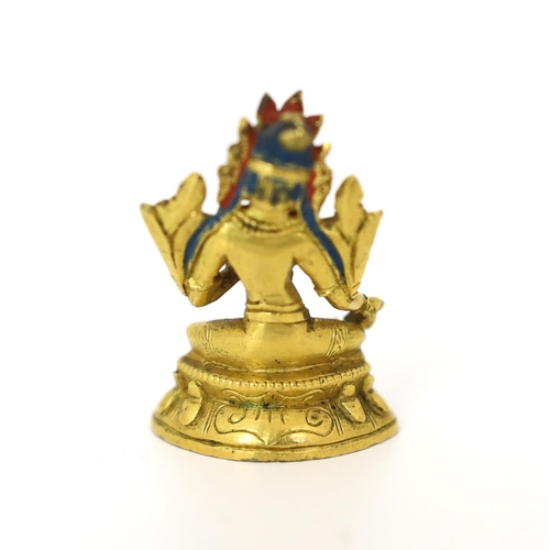 245 - * * A Tibetan miniature gilt bronze figure of Green Tara, 18th/19th century, 3cm highProvenance: G. ... 