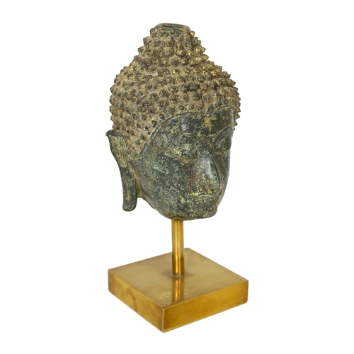 246 - * * A bronze head of Buddha, Northern Thailand, 14th century, on a stand, 13cm, (20cm overall)Proven... 