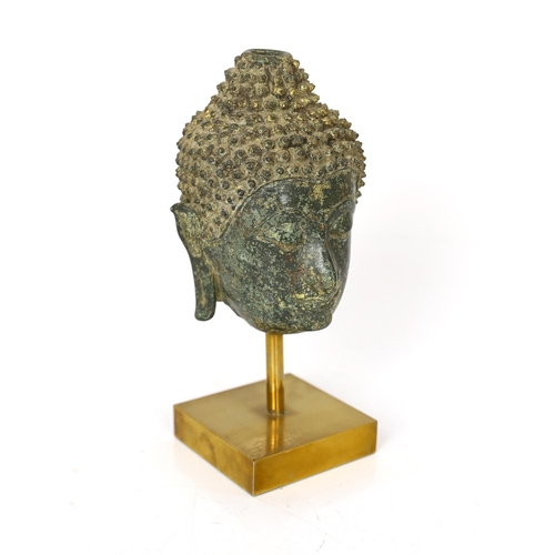 246 - * * A bronze head of Buddha, Northern Thailand, 14th century, on a stand, 13cm, (20cm overall)Proven... 