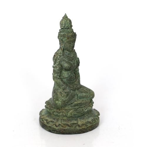 247 - * * A bronze seated figure of Tara, Central Java, 9th century, 13cmProvenance: Spink & Son Ltd, Lond... 