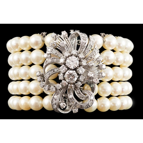 614 - A mid to late 20th century continental quintuple strand cultured pearl bracelet, with white gold and... 