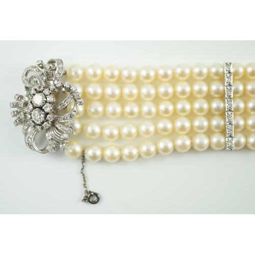 614 - A mid to late 20th century continental quintuple strand cultured pearl bracelet, with white gold and... 