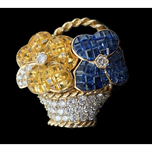 616 - A Tiffany & Co 18k gold, two colour sapphire and diamond cluster set brooch, modelled as a basket wi... 