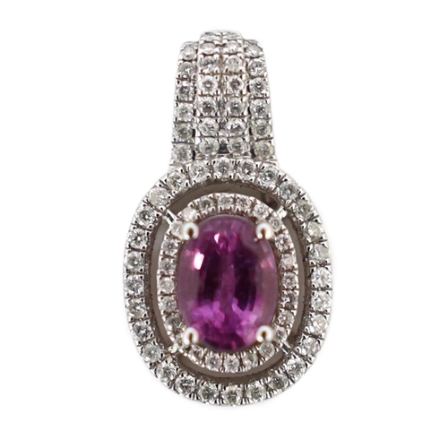 619 - A modern 14ct white gold, pink sapphire and diamond set oval cluster pendant, with four row diamond ... 