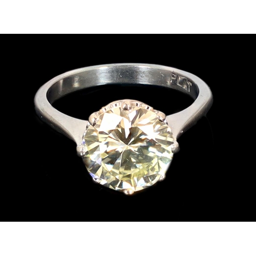 623 - A platinum and solitaire diamond set ring, the round cut stone weighing approximately 2.50ct, with a... 