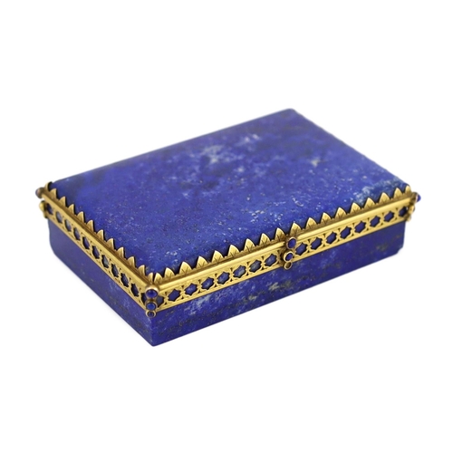 69 - A Continental gilt metal mounted lapis lazuli snuff box, c.1900, with cabochon inset mount, 9cm wide... 