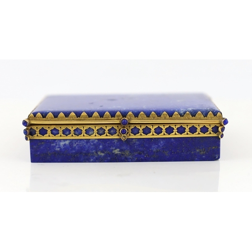 69 - A Continental gilt metal mounted lapis lazuli snuff box, c.1900, with cabochon inset mount, 9cm wide... 