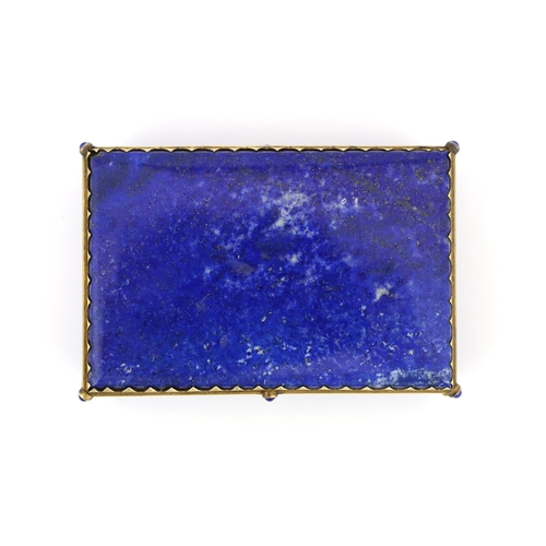 69 - A Continental gilt metal mounted lapis lazuli snuff box, c.1900, with cabochon inset mount, 9cm wide... 