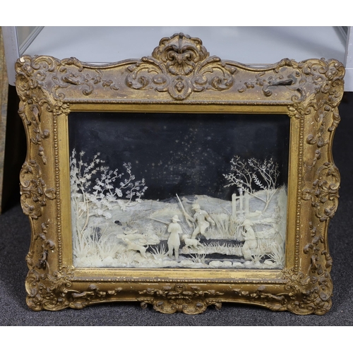 73 - A rare pair of mid 19th century carved wax pictures, depicting sportsman and dogs in a wetland lands... 