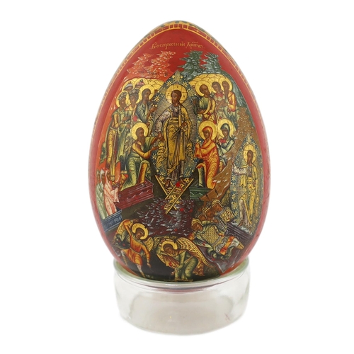 75 - * * A Russian lacquer Easter egg, attributed to Lukutin, mid 19th century, finely painted with the r... 