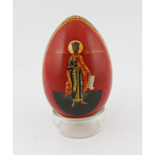 75 - * * A Russian lacquer Easter egg, attributed to Lukutin, mid 19th century, finely painted with the r... 