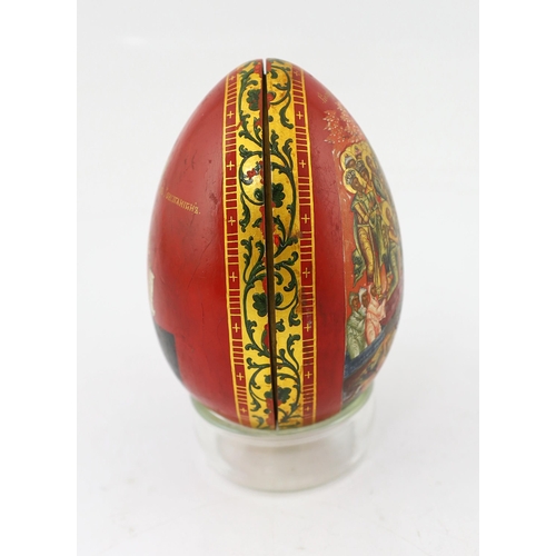 75 - * * A Russian lacquer Easter egg, attributed to Lukutin, mid 19th century, finely painted with the r... 