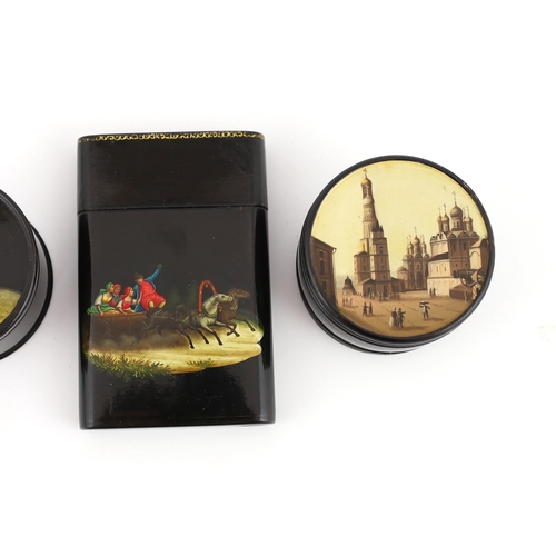 79 - * * Four Russian lacquer boxes, by Lukutin, c.1840-60, the first a rectangular snuff box finely pain... 