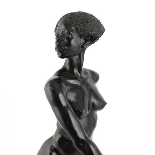 83 - Ronald Cameron (1930-2013), a black patinated cast pewter figure of an African woman, signed and num... 