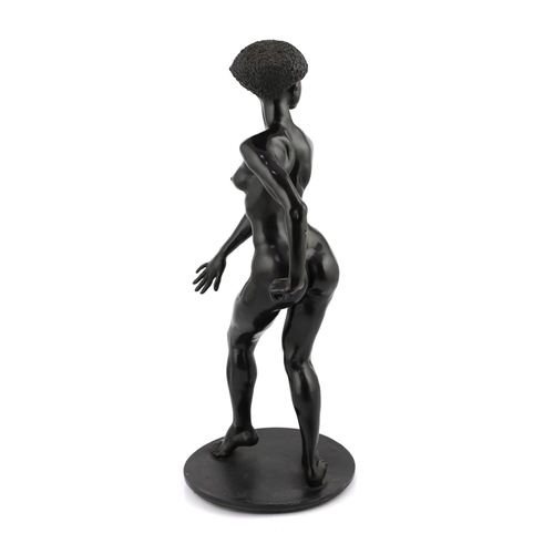 83 - Ronald Cameron (1930-2013), a black patinated cast pewter figure of an African woman, signed and num... 