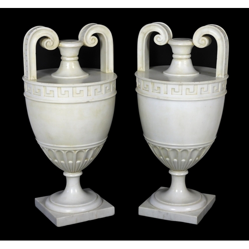 86 - * * A pair of Italian neo-classical Carrara marble vases, with scroll handles and Greek key banding,... 