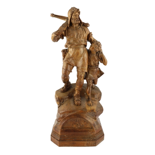 89 - Jacob Abplanalp of Grindelwald, a carved group of William Tell and his son, standing upon a naturali... 