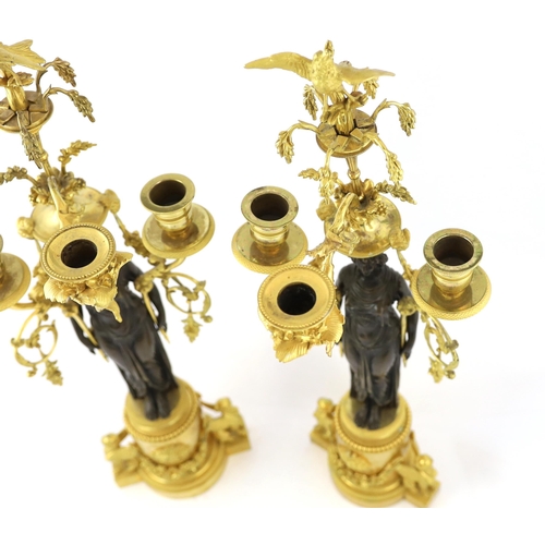 97 - * * A pair of late 19th century French Empire style bronze and ormolu three light candelabra, with b... 