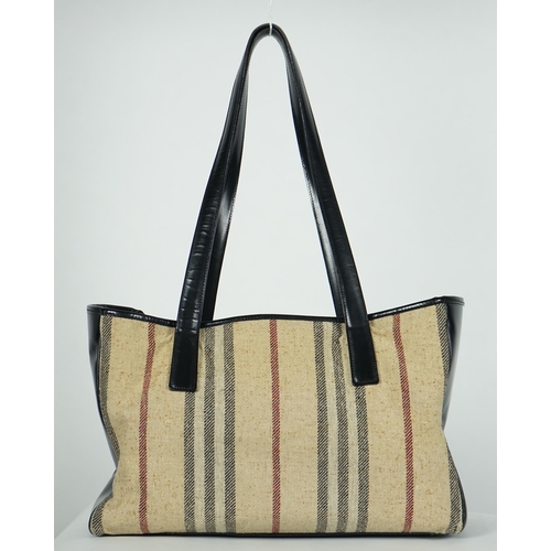 1000 - A Burberry fabric and black leather shopper, width 40cm, height 25cm, height overall 56cm, depth 17c... 