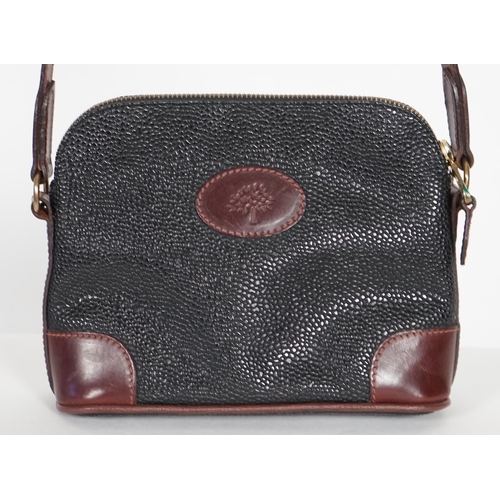 1002 - A Mulberry crossbody bag, pebble grained black leather with brown leather corner reinforcement contr... 