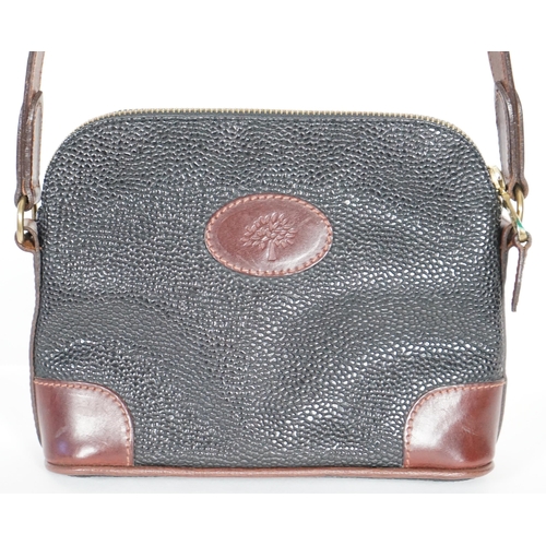 1002 - A Mulberry crossbody bag, pebble grained black leather with brown leather corner reinforcement contr... 