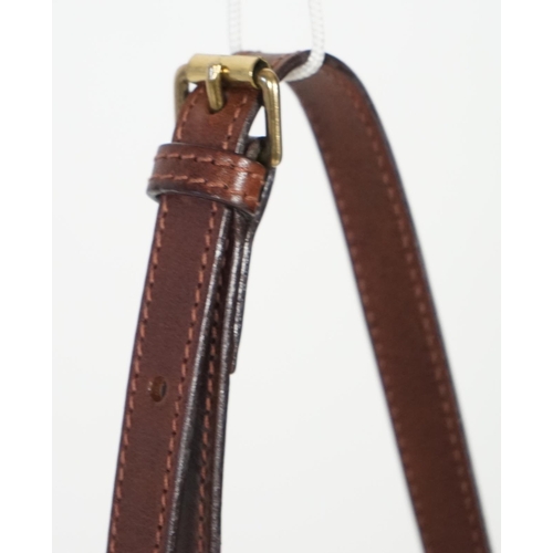 1002 - A Mulberry crossbody bag, pebble grained black leather with brown leather corner reinforcement contr... 