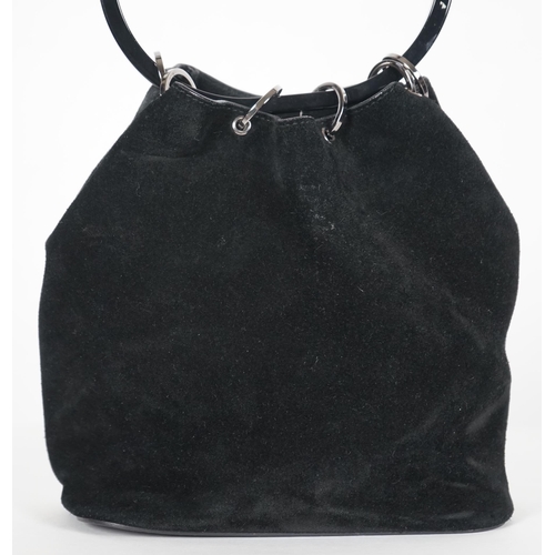 1005 - ** ** A vintage Gucci black Tom Ford era suede handbag, with dust bag, silver-tone hardware, a singl... 