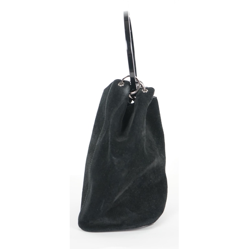 1005 - ** ** A vintage Gucci black Tom Ford era suede handbag, with dust bag, silver-tone hardware, a singl... 