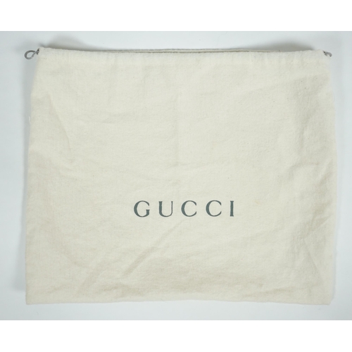 1005 - ** ** A vintage Gucci black Tom Ford era suede handbag, with dust bag, silver-tone hardware, a singl... 