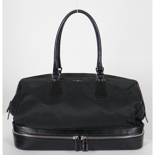 1008 - A Prada Tessuto black nylon and leather bag, width 38cm, height 23cm, depth 50cm