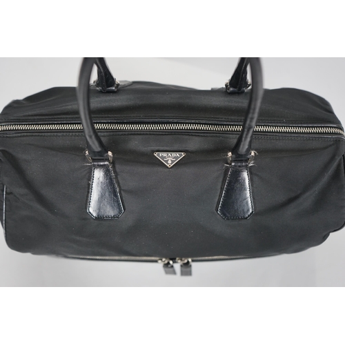 1008 - A Prada Tessuto black nylon and leather bag, width 38cm, height 23cm, depth 50cm