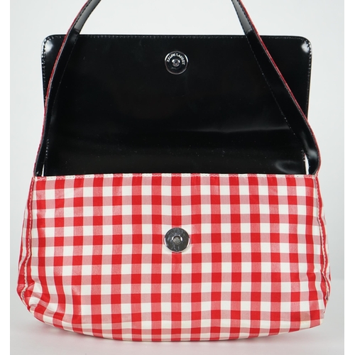 1010 - A Ralph Lauren red and white gingham satin evening bag, width 22cm, height 14cm, overall height 30cm... 