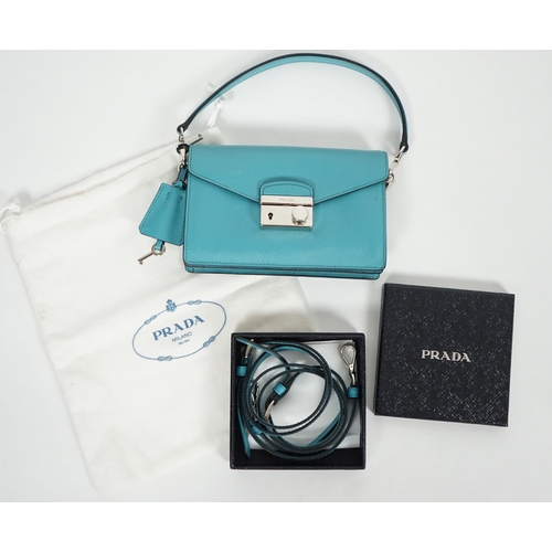 1011 - A Prada Saffiano Lux Mini Sound bag in Turchese, silver-tone hardware, with bag, box and paperwork. ... 