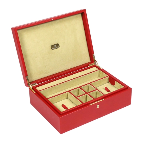 1014 - A Fabergé cased red leather jewellery box, width 33cm