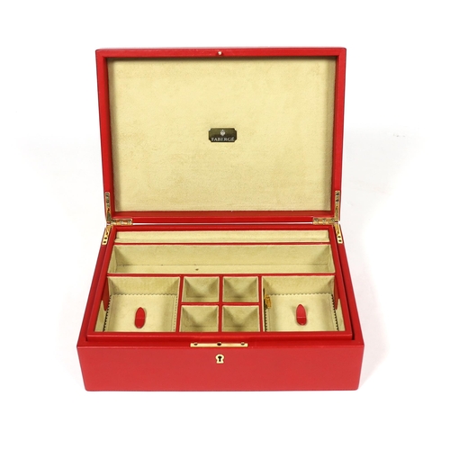 1014 - A Fabergé cased red leather jewellery box, width 33cm