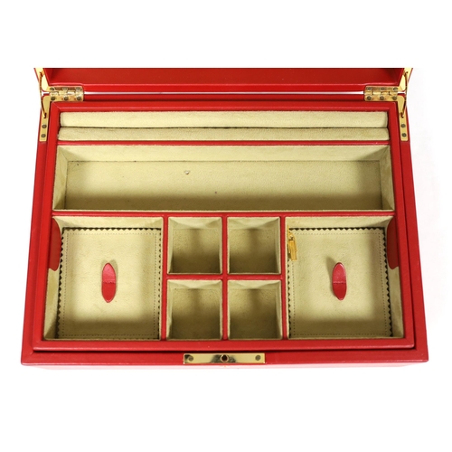 1014 - A Fabergé cased red leather jewellery box, width 33cm