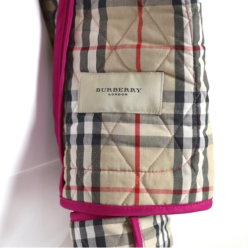 1017 - Two Burberry lady's quilted jackets, one pink and the other green, size Medium