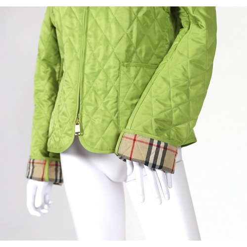 1017 - Two Burberry lady's quilted jackets, one pink and the other green, size Medium