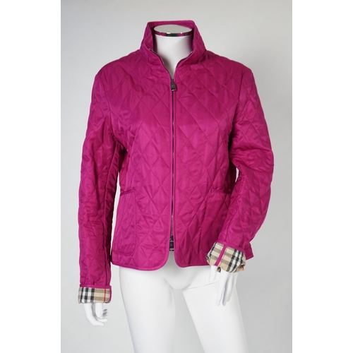 1017 - Two Burberry lady's quilted jackets, one pink and the other green, size Medium