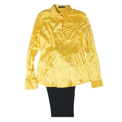 1018 - A lady's Dolce & Gabbana yellow silk blouse and a pair of black satin jeans. Blouse size 44 Trousers... 